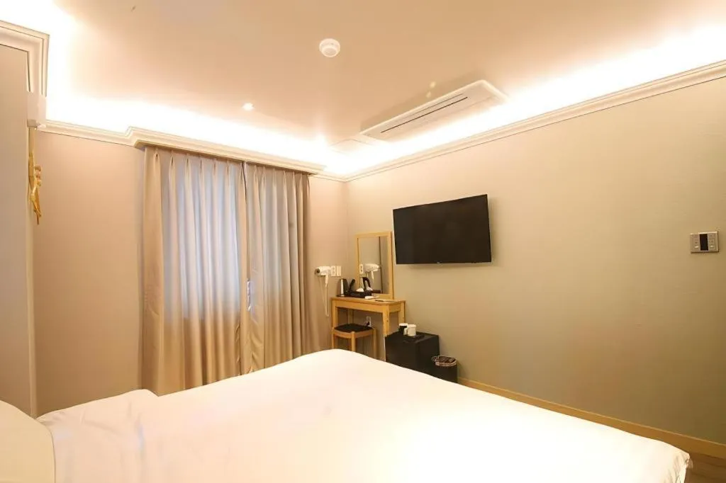 Bed in Jeju Sejong Hotel