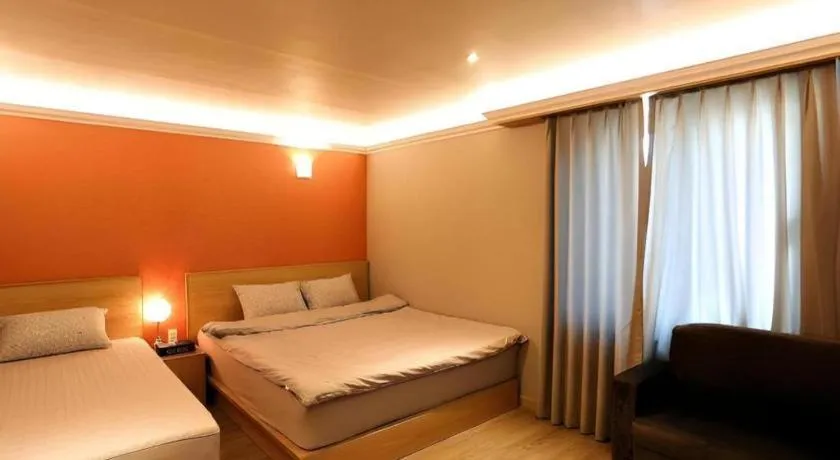 Bed in Jeju Sejong Hotel