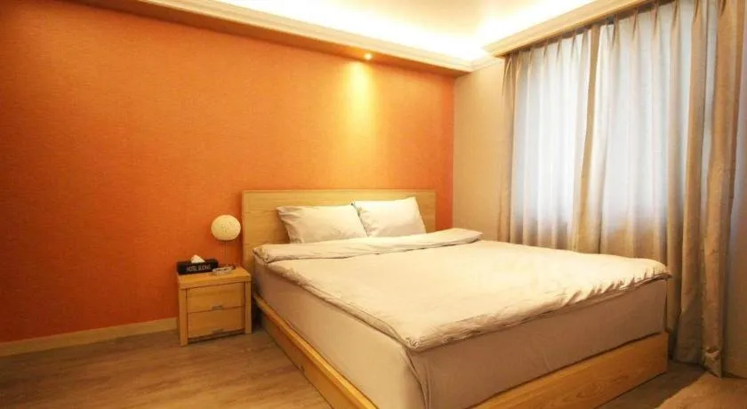 Bed in Jeju Sejong Hotel