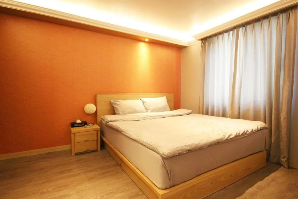 Bed in Jeju Sejong Hotel