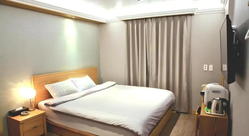 Bed in Jeju Sejong Hotel