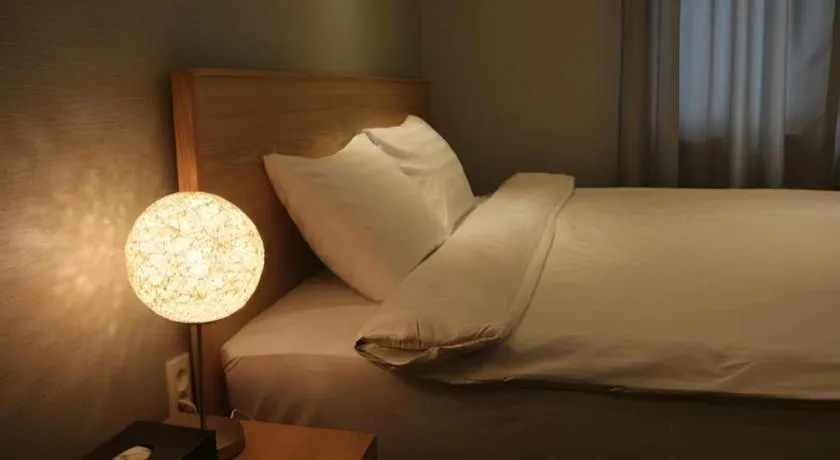 Bed in Jeju Sejong Hotel