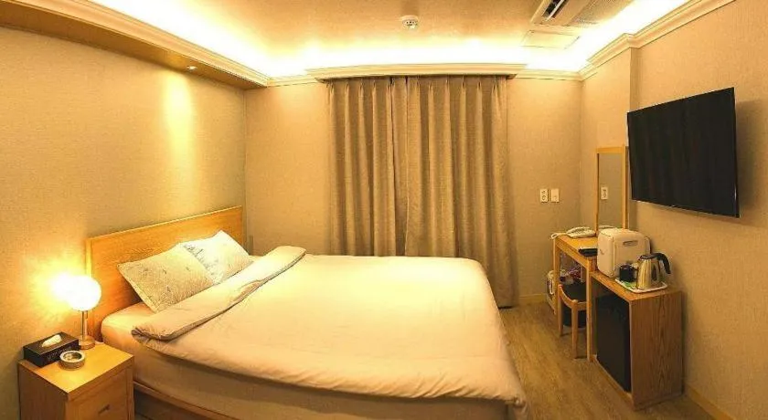 Bed in Jeju Sejong Hotel