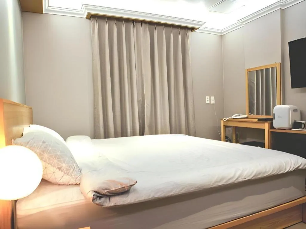 Bed in Jeju Sejong Hotel