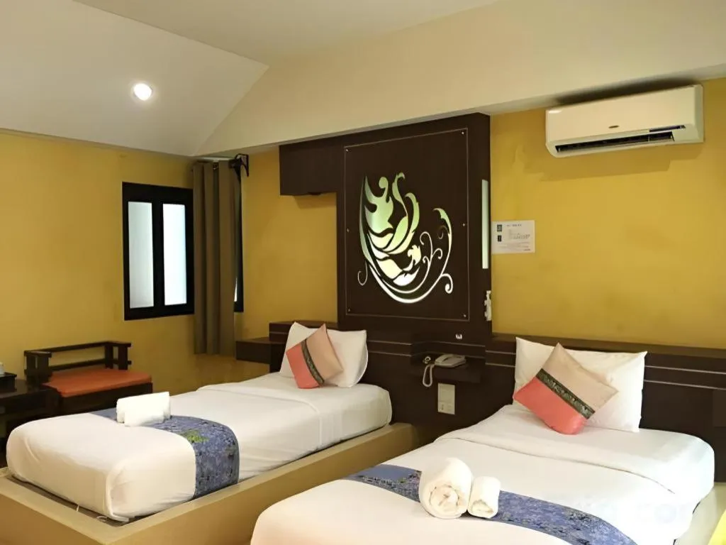 Bed in Tanisa Resort