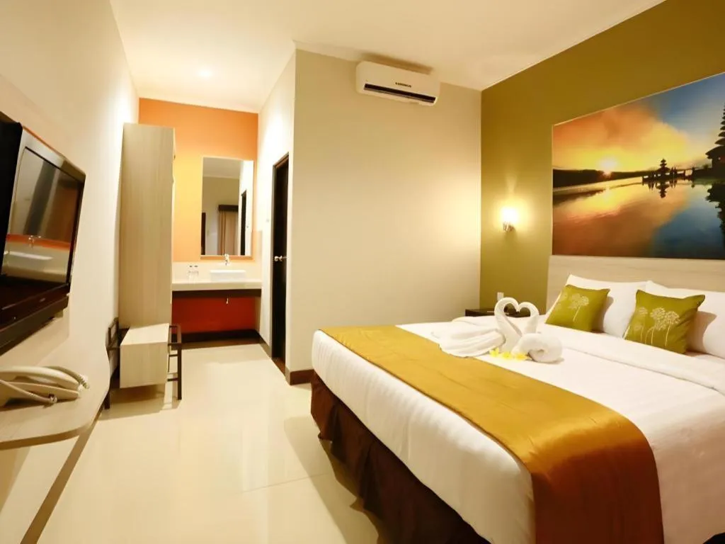 Bed in Asoka City Bali Hotel