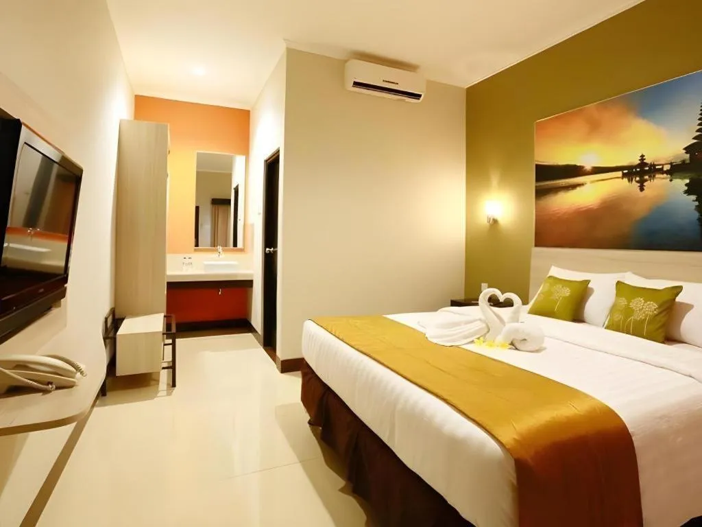 Bed in Asoka City Bali Hotel