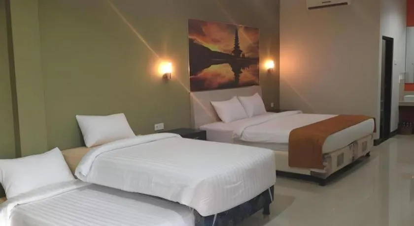 Bed in Asoka City Bali Hotel