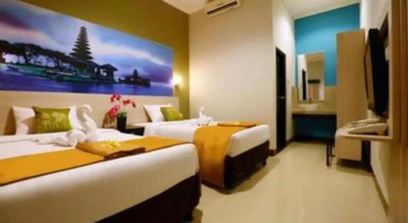 Bed in Asoka City Bali Hotel