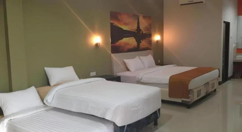 Bed in Asoka City Bali Hotel