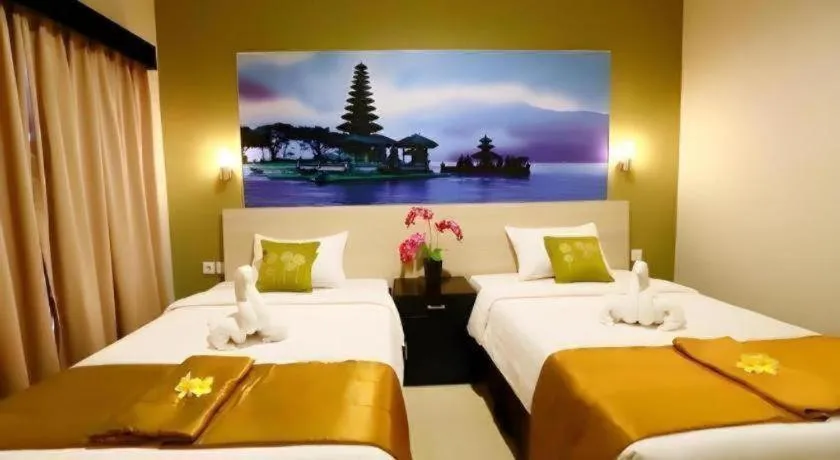 Bed in Asoka City Bali Hotel