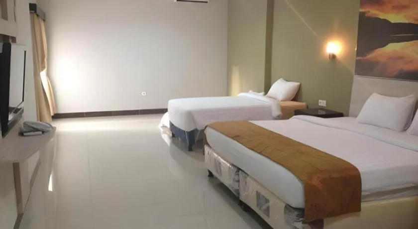 Bed in Asoka City Bali Hotel