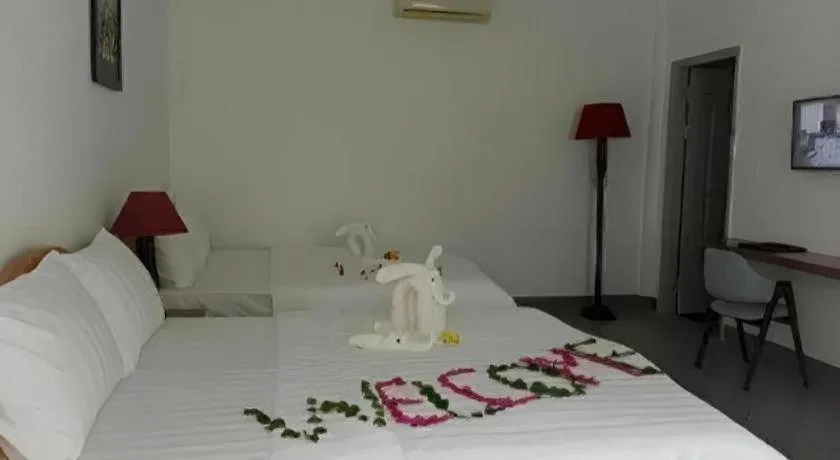 Bed in Damina boutique hotel