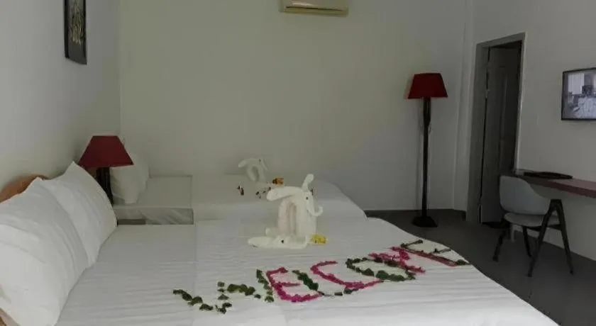 Bed in Damina boutique hotel