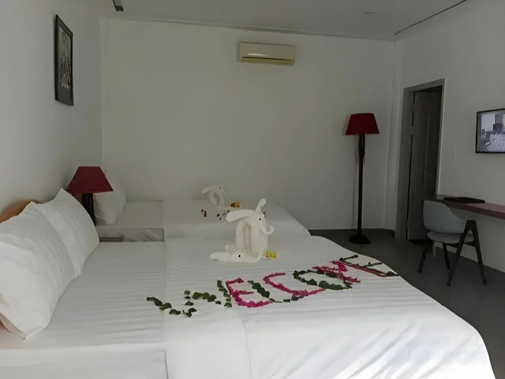 Bed in Damina boutique hotel