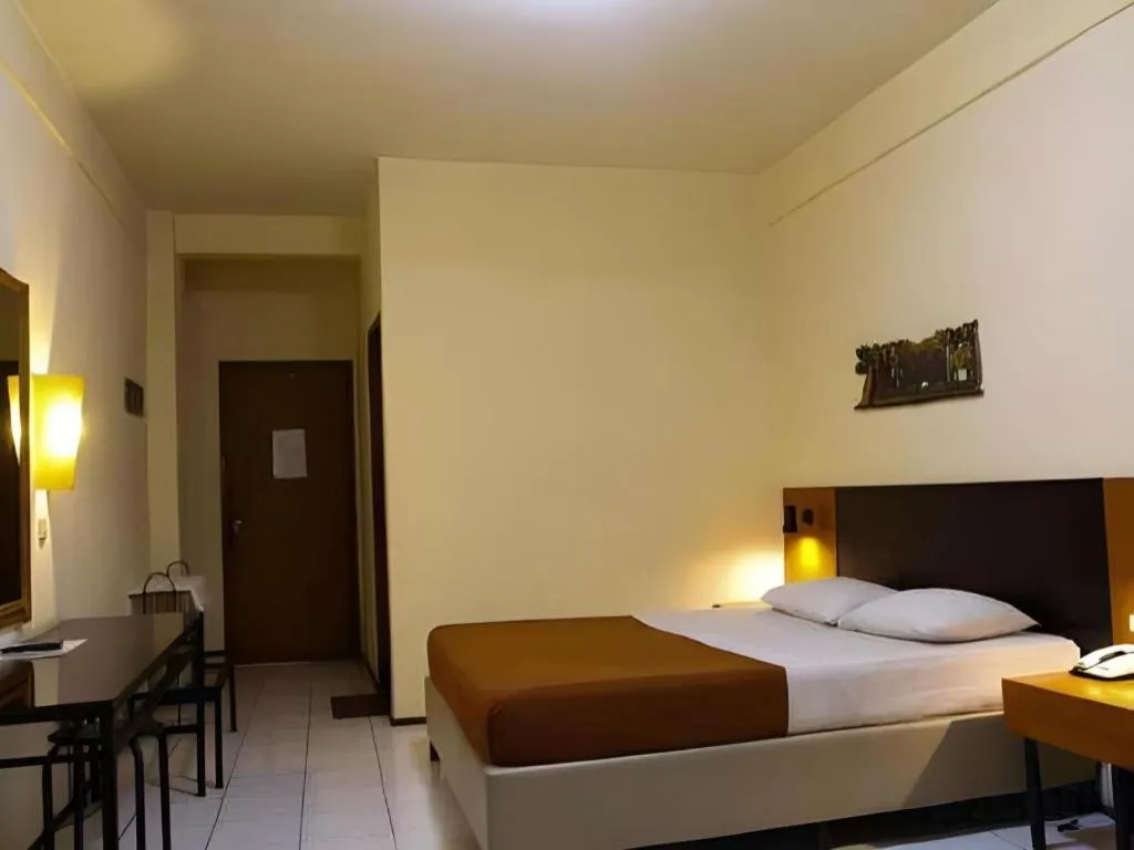 Bed in Augusta Hotel & Glamping Sukabumi