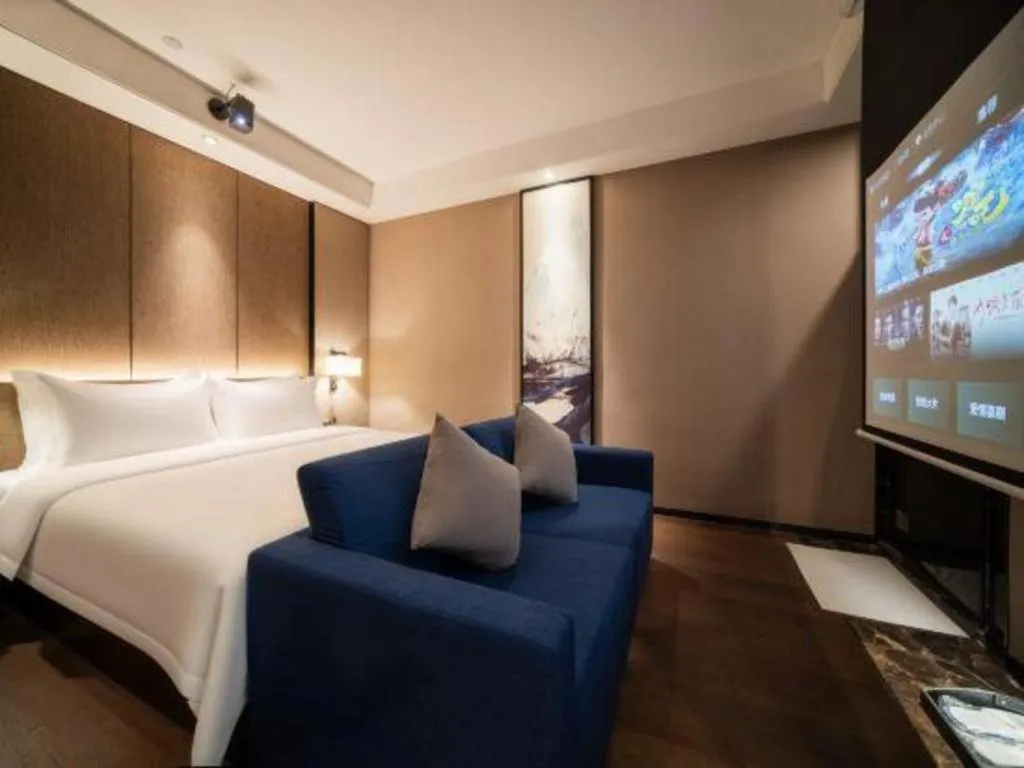 Bed in Zhonghao Boutique Hotel Dalang Business Center