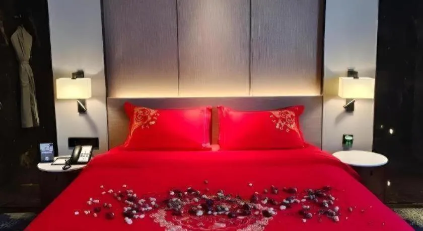 Bed in Zhonghao Boutique Hotel Dalang Business Center