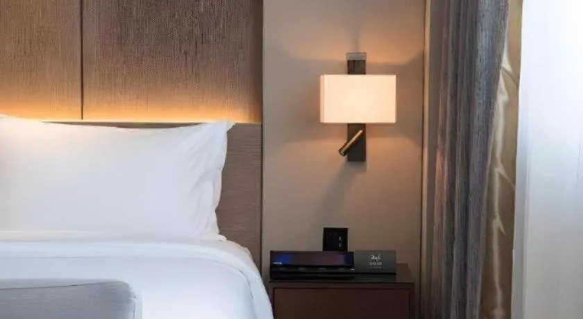 Bed in Zhonghao Boutique Hotel Dalang Business Center