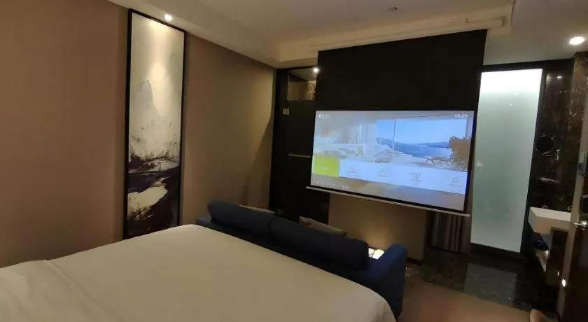 Bed in Zhonghao Boutique Hotel Dalang Business Center
