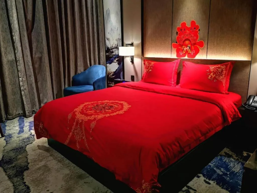 Bed in Zhonghao Boutique Hotel Dalang Business Center