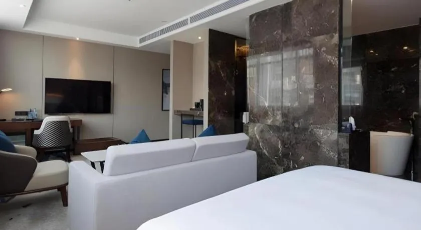 Bed in Zhonghao Boutique Hotel Dalang Business Center