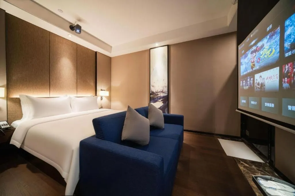 Bed in Zhonghao Boutique Hotel Dalang Business Center