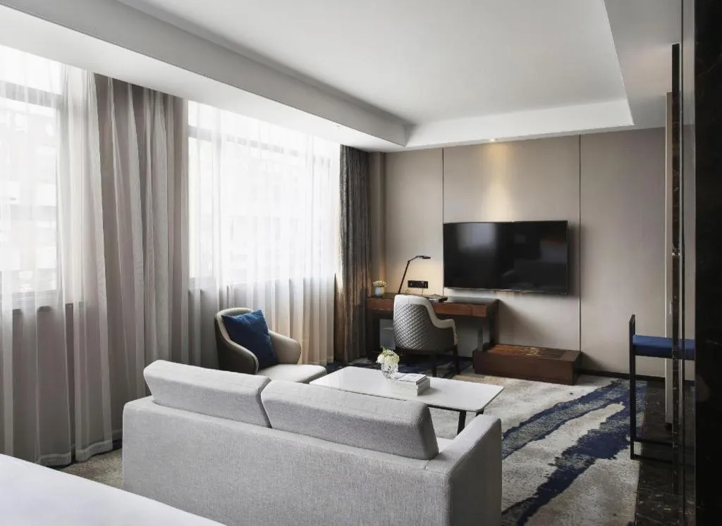 Bed in Zhonghao Boutique Hotel Dalang Business Center