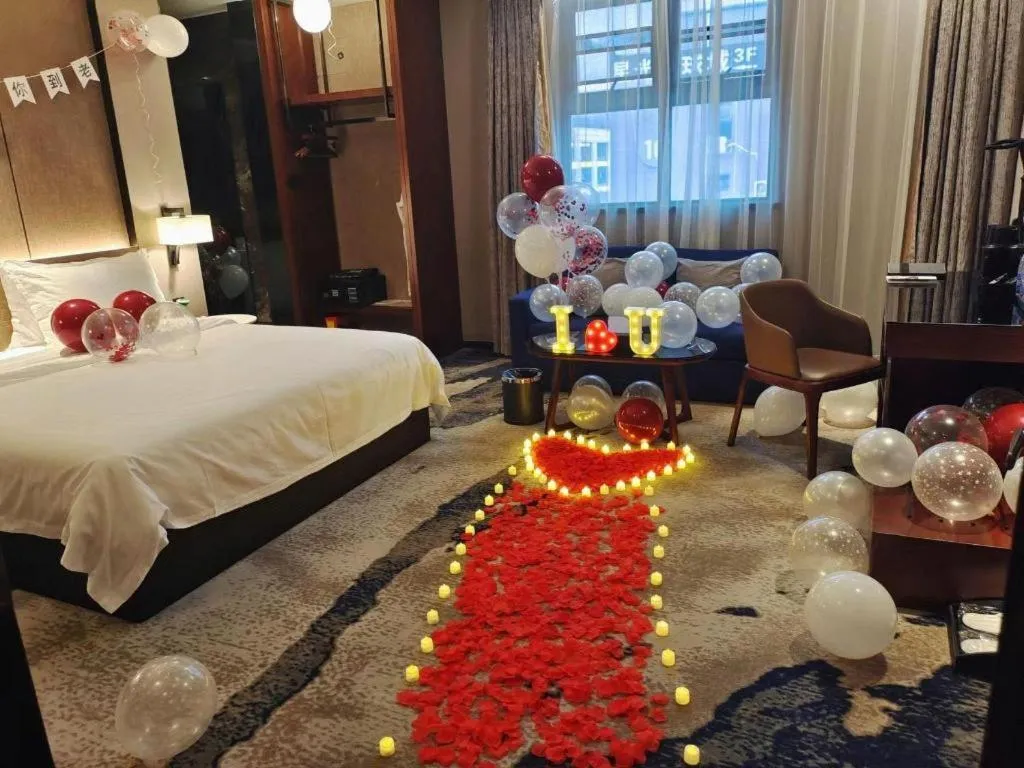 Bed in Zhonghao Boutique Hotel Dalang Business Center