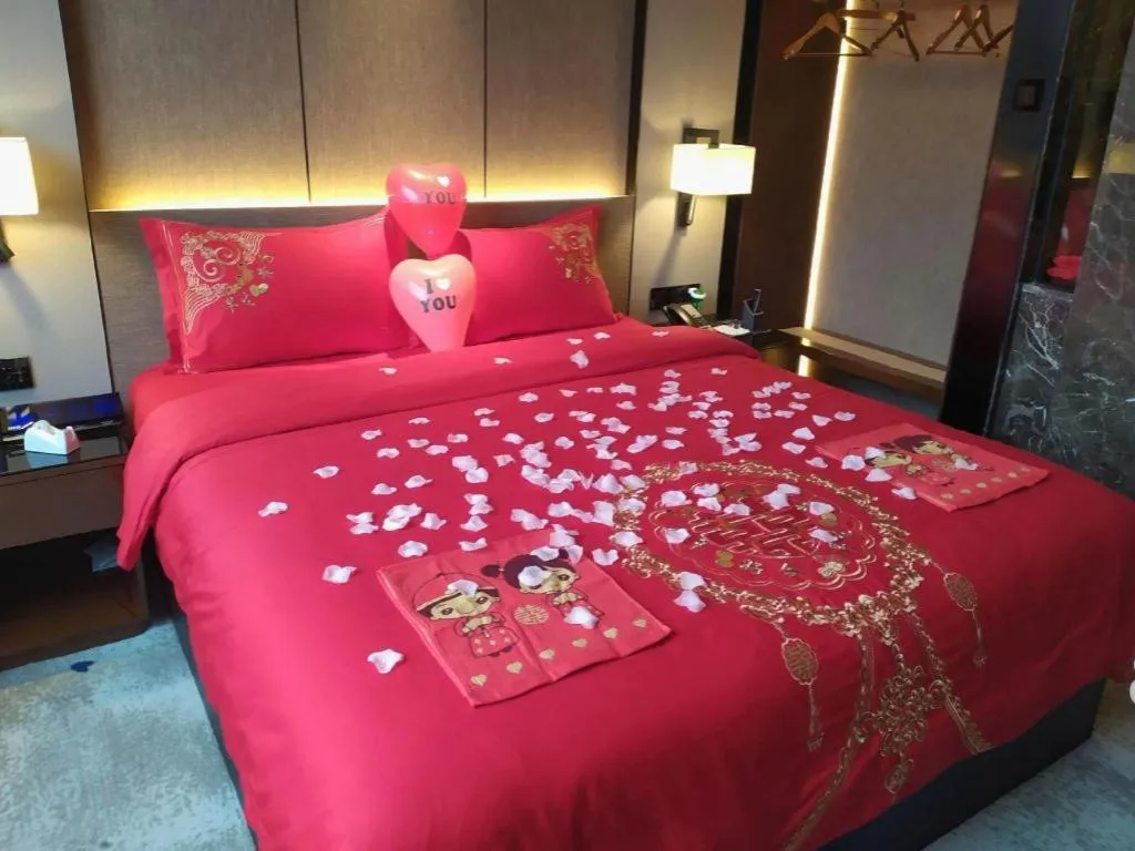 Bed in Zhonghao Boutique Hotel Dalang Business Center