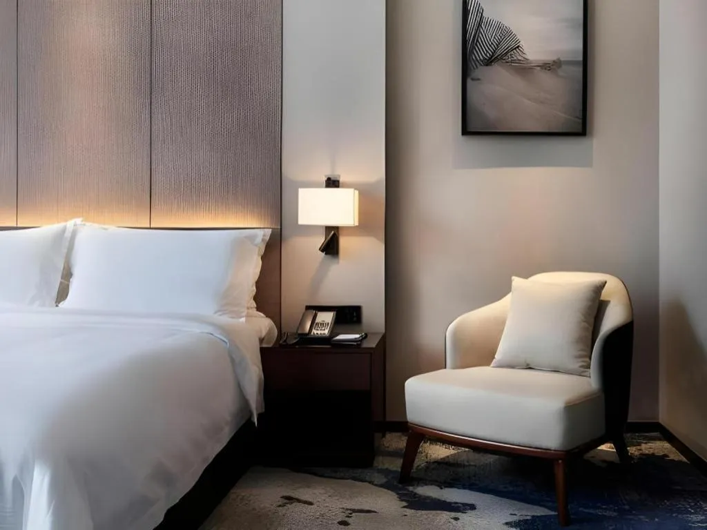 Bed in Zhonghao Boutique Hotel Dalang Business Center