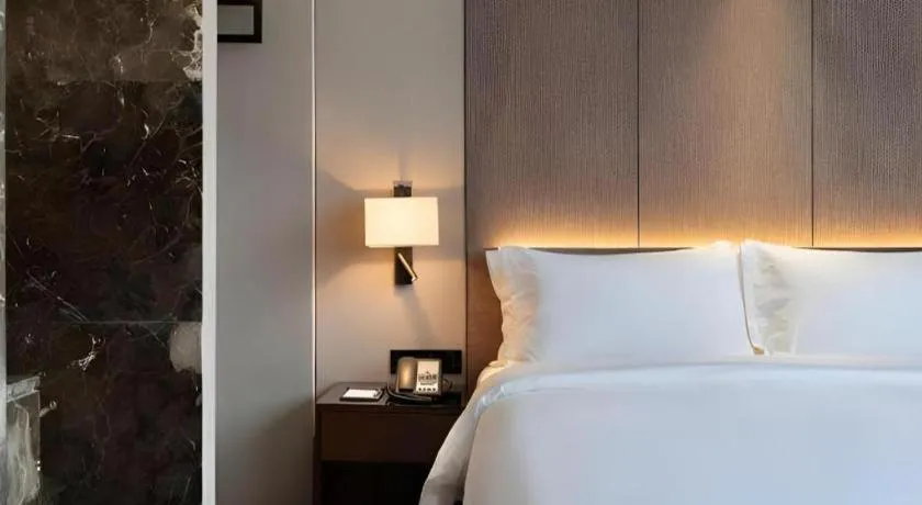 Bed in Zhonghao Boutique Hotel Dalang Business Center