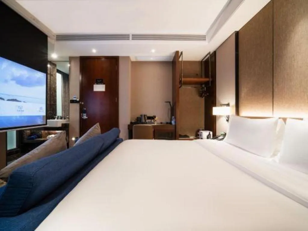 Bed in Zhonghao Boutique Hotel Dalang Business Center