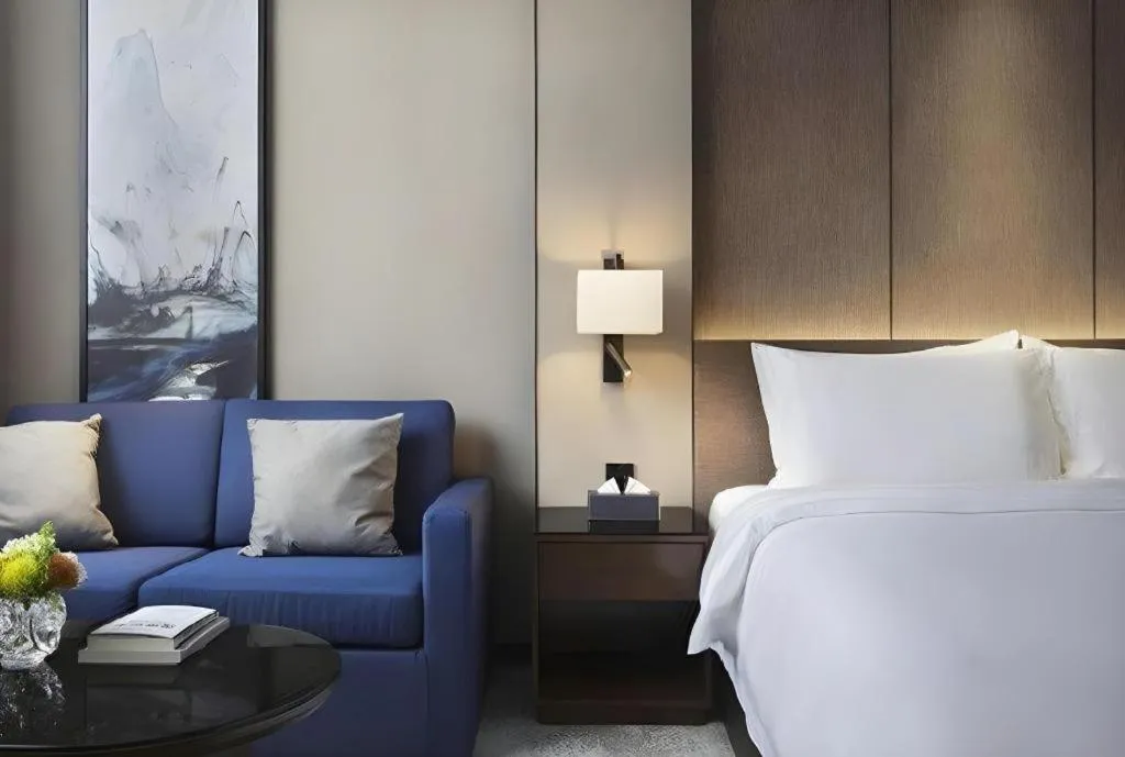 Bed in Zhonghao Boutique Hotel Dalang Business Center