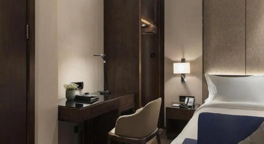 Bed in Zhonghao Boutique Hotel Dalang Business Center