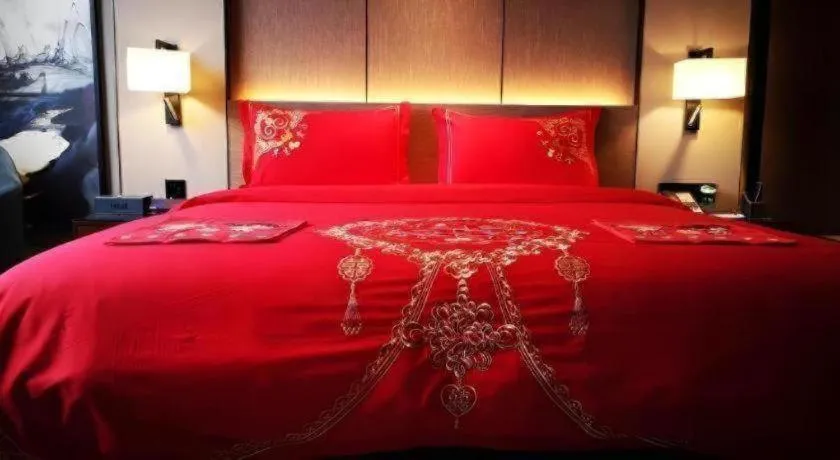 Bed in Zhonghao Boutique Hotel Dalang Business Center