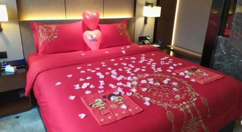 Bed in Zhonghao Boutique Hotel Dalang Business Center