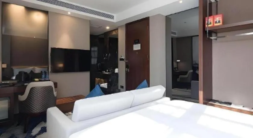 Bed in Zhonghao Boutique Hotel Dalang Business Center