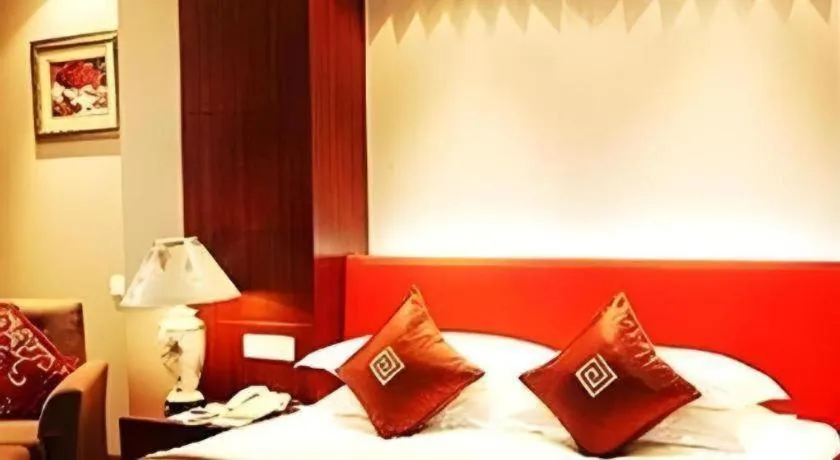 Bed in New Century Pujiang Hotel