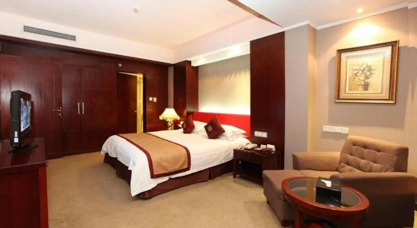 Bed in New Century Pujiang Hotel