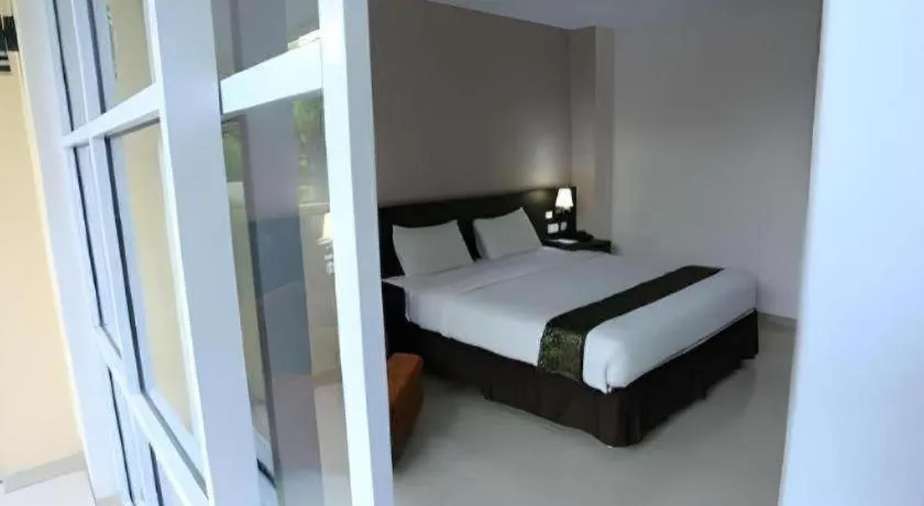 Bed in Grand Hawaii Hotel Pekanbaru