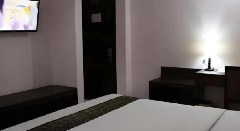 Bed in Grand Hawaii Hotel Pekanbaru