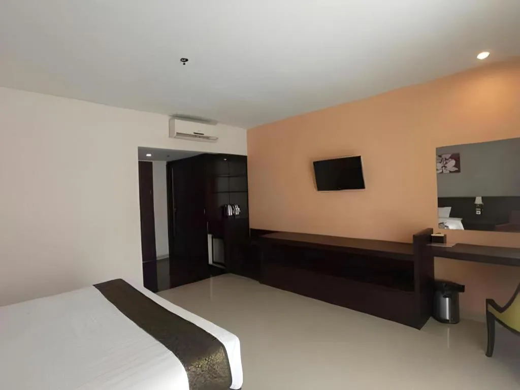 Bed in Grand Hawaii Hotel Pekanbaru