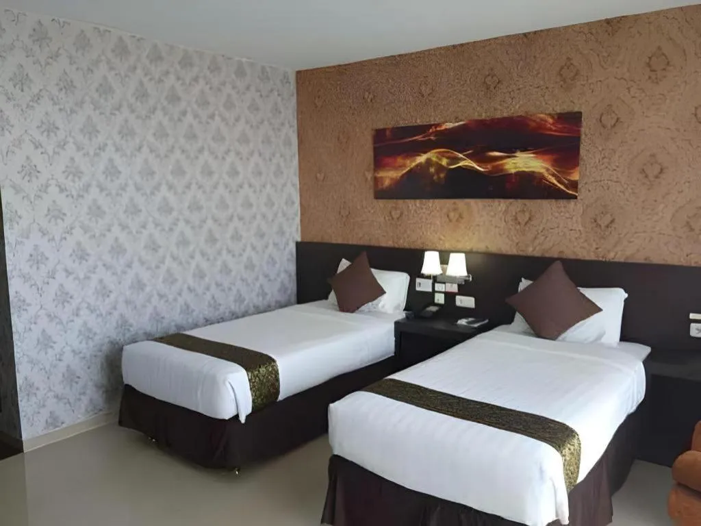 Bed in Grand Hawaii Hotel Pekanbaru