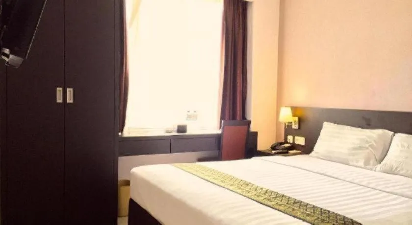 Bed in Grand Hawaii Hotel Pekanbaru