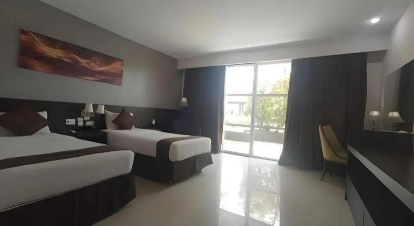 Bed in Grand Hawaii Hotel Pekanbaru