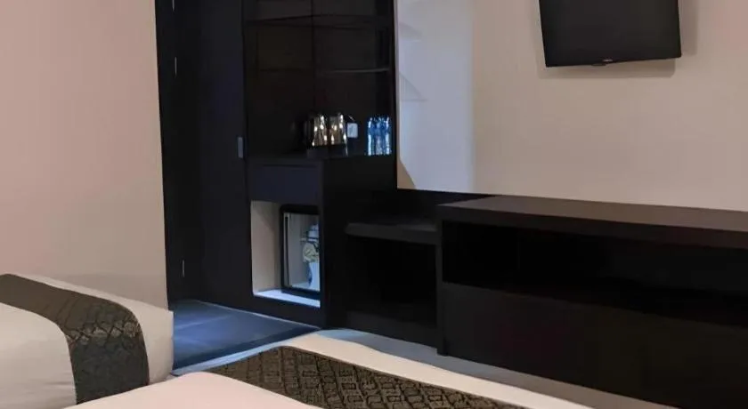 Bed in Grand Hawaii Hotel Pekanbaru