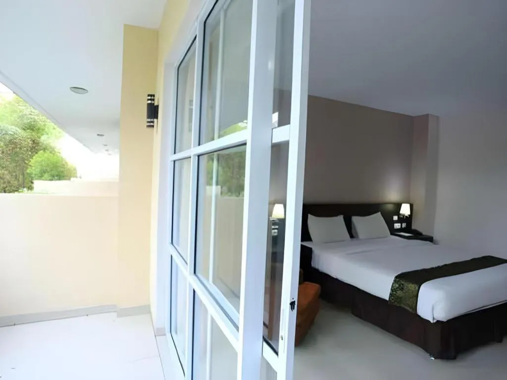 Bed in Grand Hawaii Hotel Pekanbaru