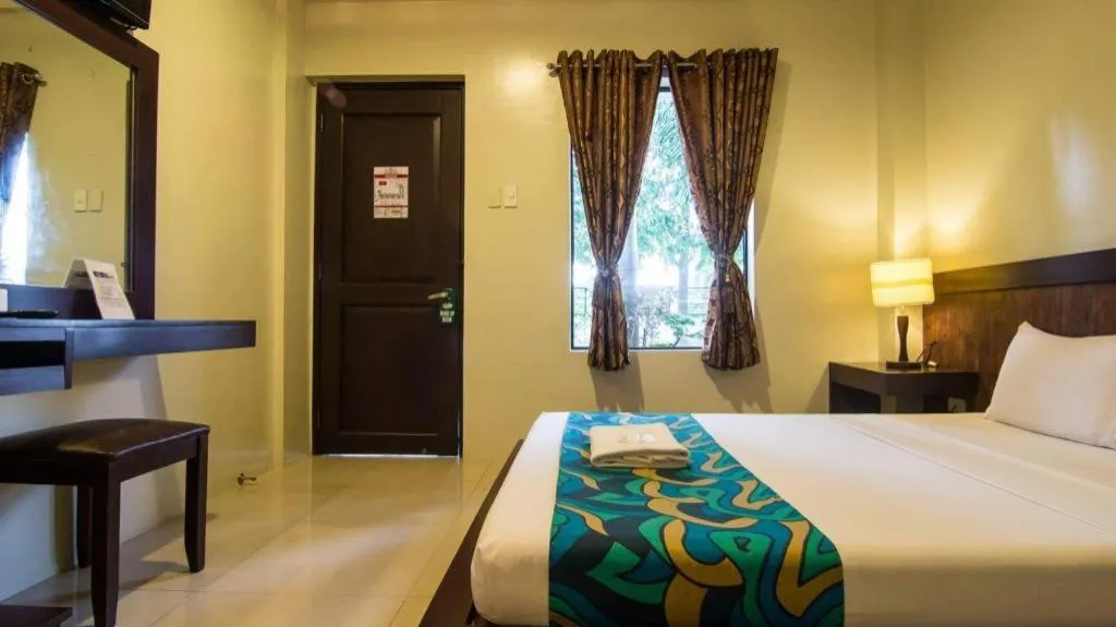 Bed in Driggs Pension House