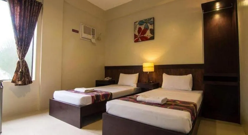 Bed in Driggs Pension House